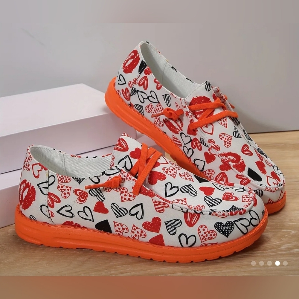 Womans size 9 Heart Print Shoes - Orange and Red